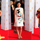 Image for article titled Lots of Red, Charming Crocs, & Strange Headgear at the TV BAFTA Awards